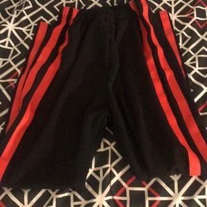 Black leggings with red stripes